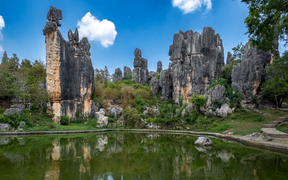 Limestone pillars and their reflection in Shilin near Kunming