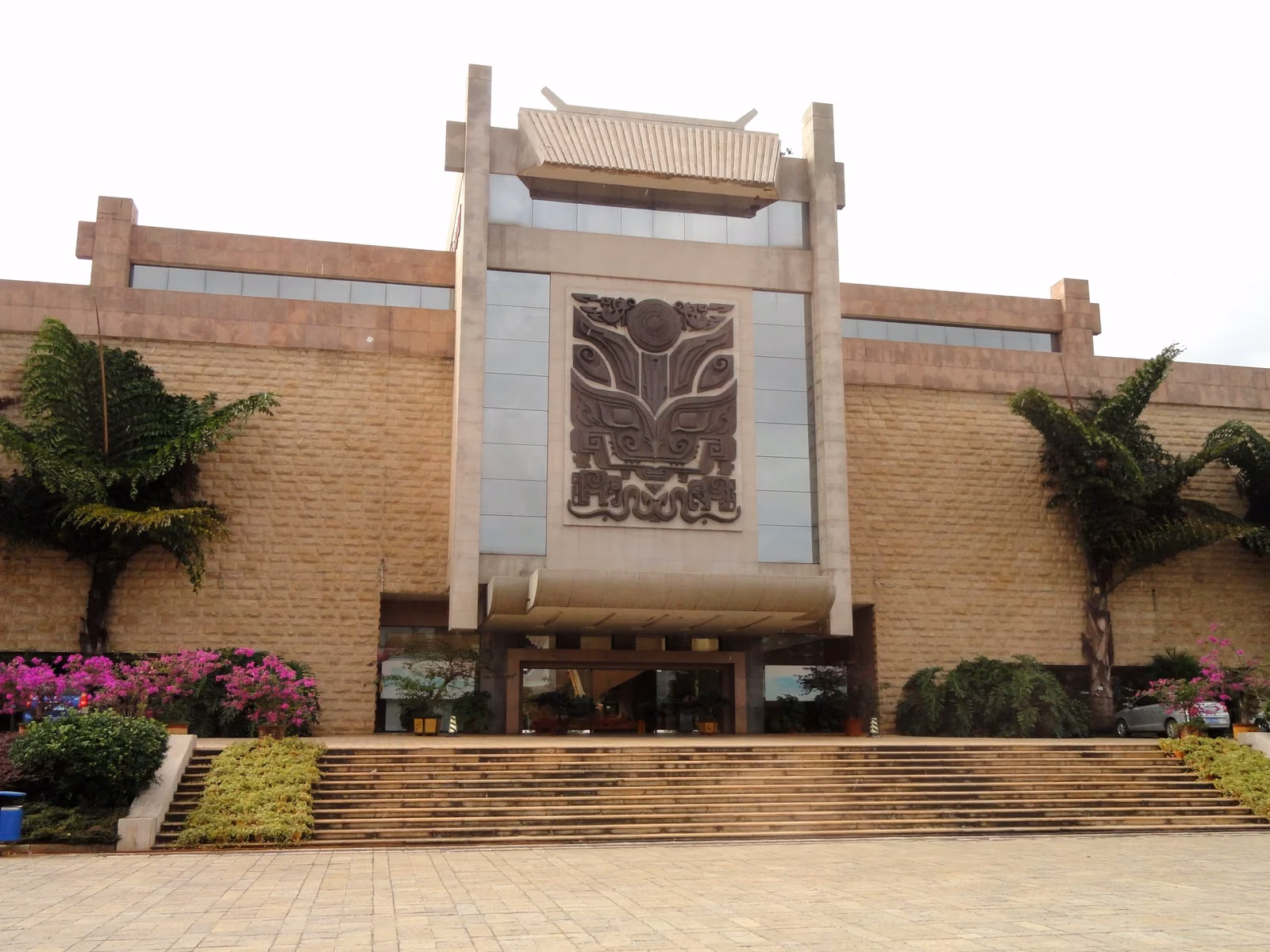 Entrance steps and large relief on the facade of the Yunnan Nationalities Museum in Kunming
