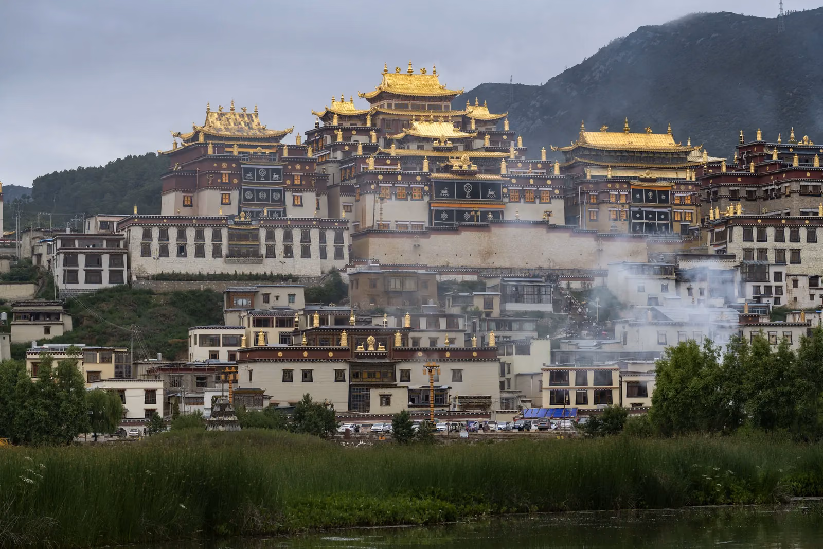 Golden roofs and white walls of Songzanlin Monastery in Shangri-La