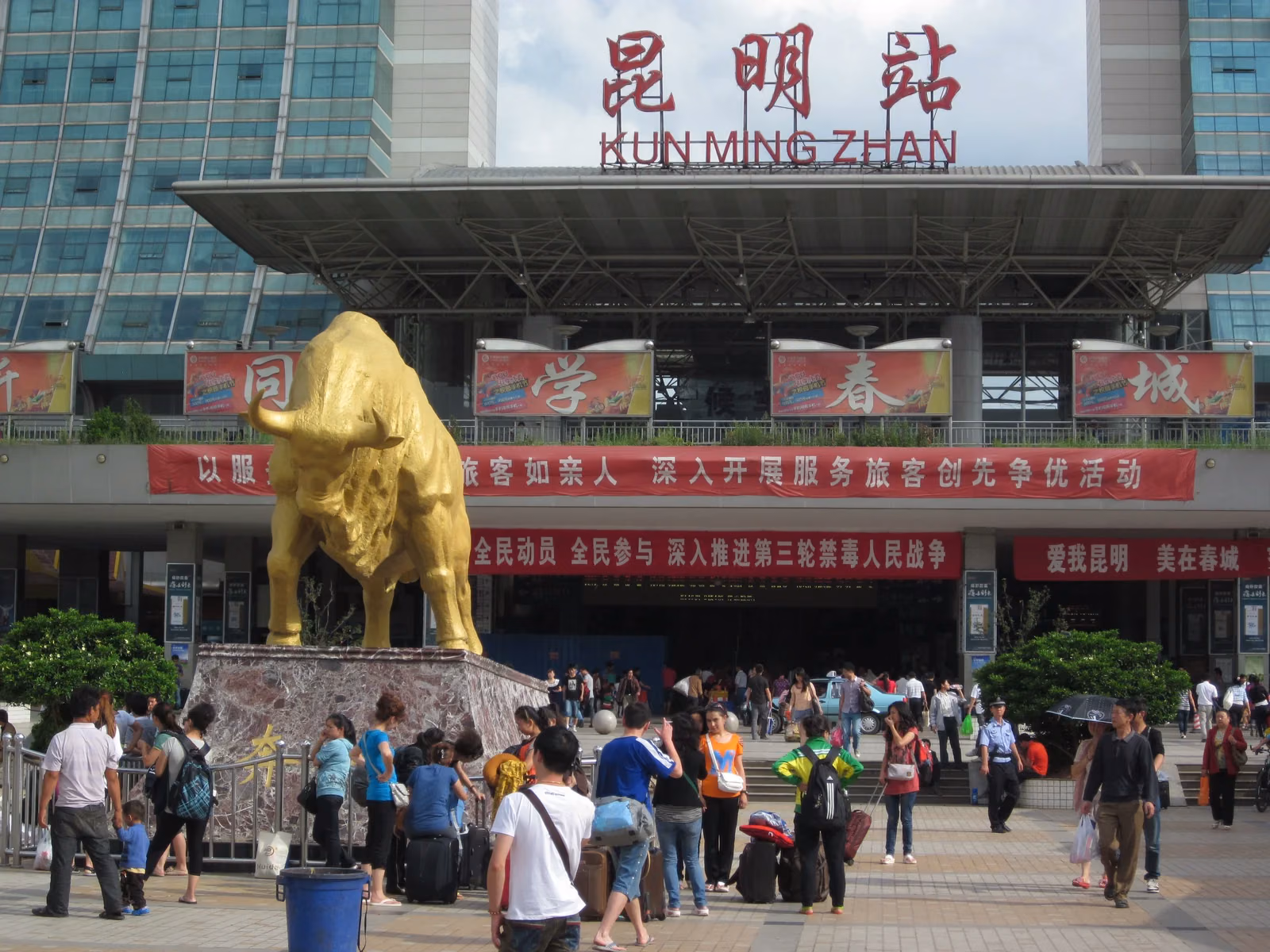 Kunming Station north facade and golden bull sculpture, photographed in 2012